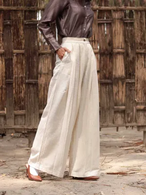 Eri Silk Easy pleated pants with cross pockets.
