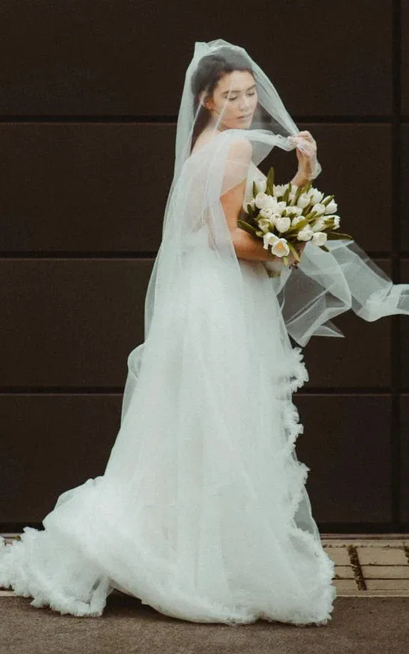 Modern A Line Tulle Spaghetti Neckline Sleeveless Wedding Dress with Tiers