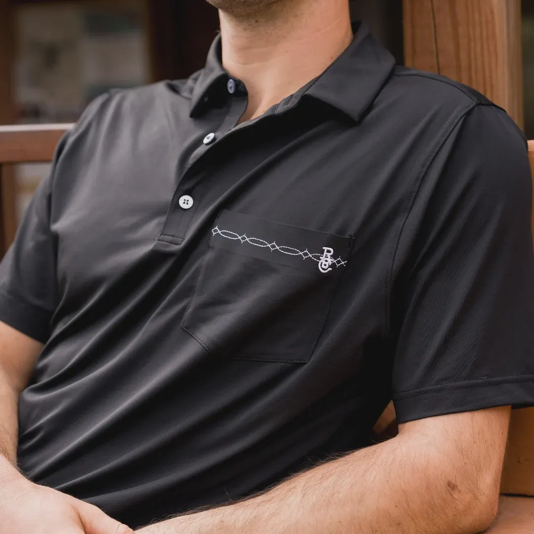 Raised by Coyotes Black Bootstitch Pocket Polo