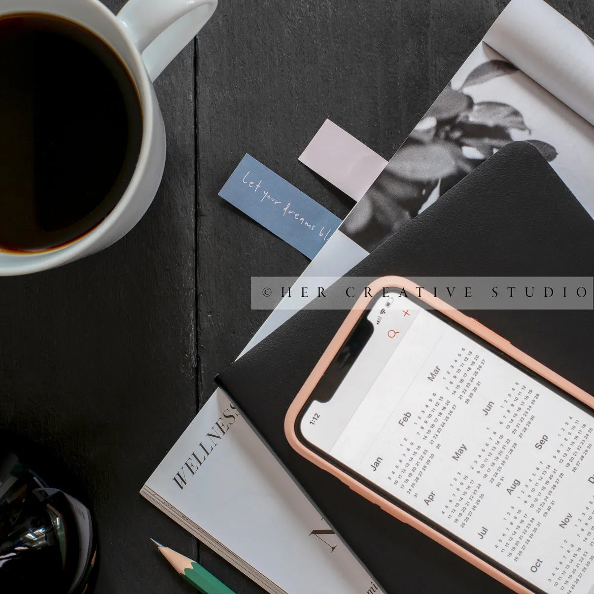Smartphone with Calendar Stock Photo on Black Desk