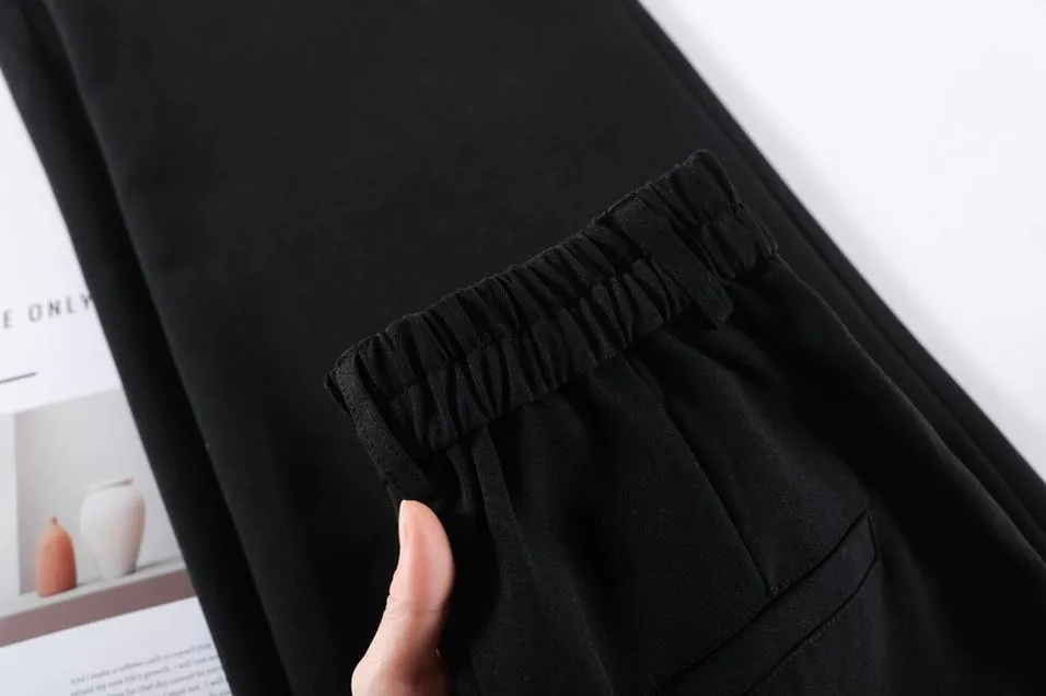 Women's Solid Wide-Leg Pleated Trousers for a Chic Look